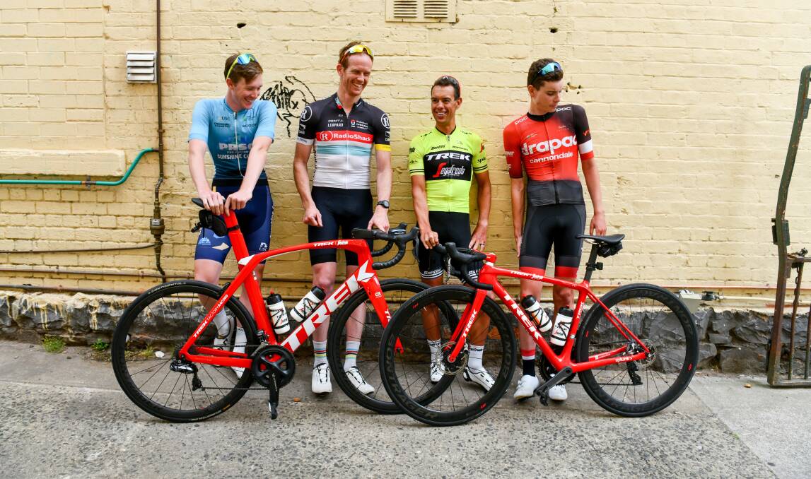 Writing on the wall: Relaxing after a morning ride are Zack Gilmore, Ali Foot, Richie Porte and Zac Johnson. Picture: Scott Gelston