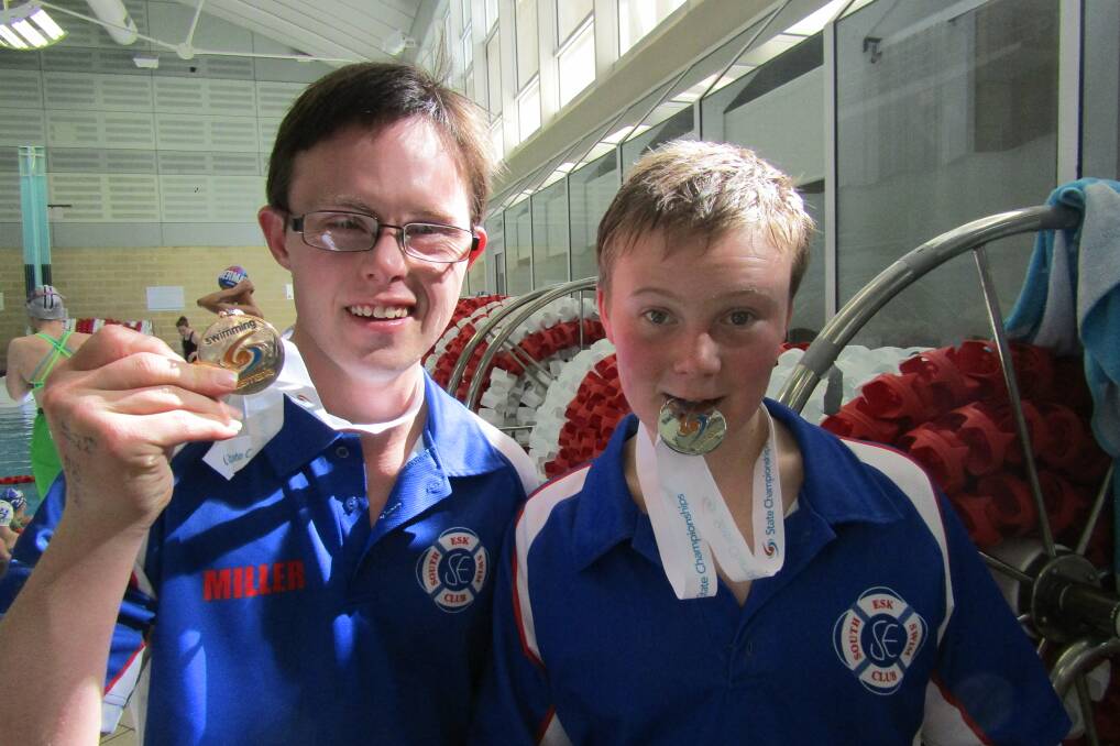 Top two: South Esk teammates Aran Miller and Jonathan Clarke medallists in the men's 50m freestyle multi-class.