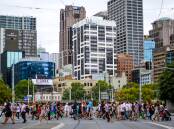 A busy crosswalk in downtown Melbourne. Australia's current population of about 25 million is nowhere near high enough from a national security perspective. Picture: Shutterstock