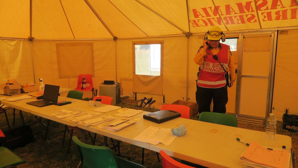 COMMAND: Air base manager Alex Howen in the base's operations tent. Picture: Emily Jarvie. 