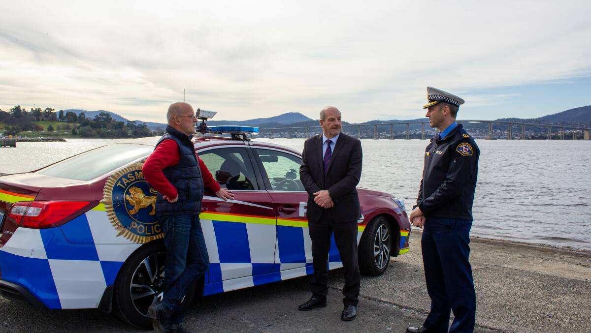 SLOW DOWN: Road Safety Advisory Council chairman Garry Bailey, Police, Fire and Emergency Management Minister Mark Shelton and Tasmania Police Assistant Commissioner Jonathan Higgins in Hobart. Picture: supplied 
