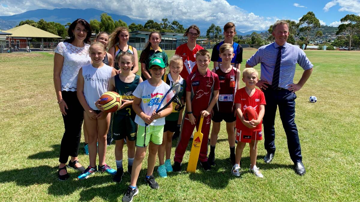 LAUNCH: Premier Will Hodgman and Minster for Sport and Recreation Jacquie Petrusma with Howrah Primary School students at the Ticket to Play launch. Picture: supplied. 