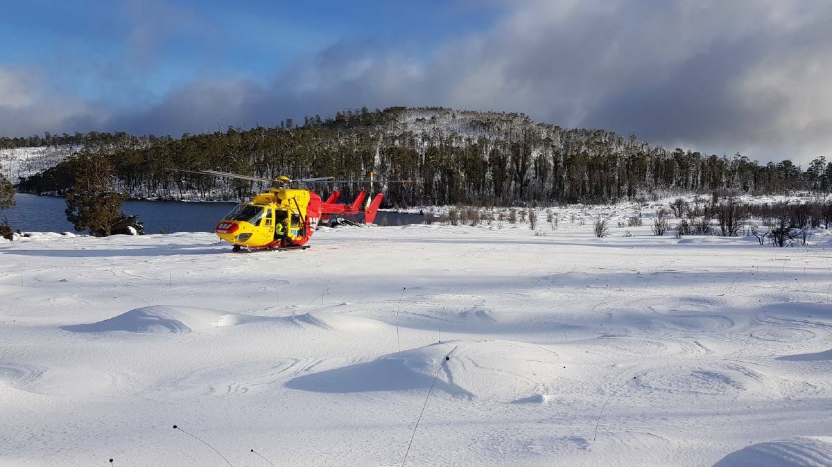 GROUNDED: Attempts to rescue hikers via helicopter were disrupted by dangerous weather conditions. Picture: Tasmania Police 