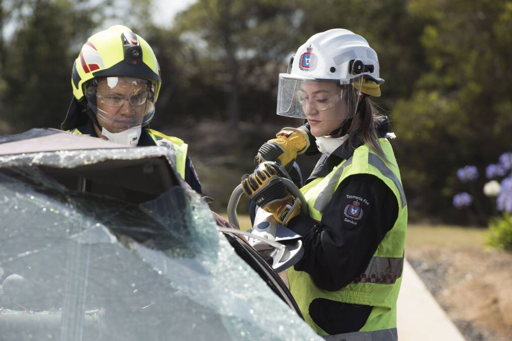 RECRUITS: Recent Tasmania Fire Service graduates Watene Kuka and Elyse Hatchard in training. Picture: supplied 