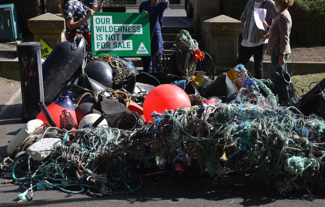 POLLUTION: Marine debris collected on the Tasman Peninsula displayed on Parliament Lawns in Hobart. Picture: Emily Jarvie 
