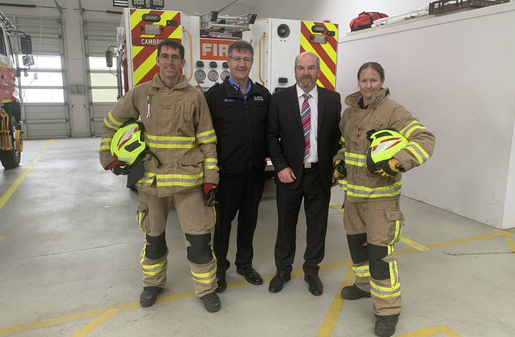 Firefighter Luke Prismall, TFS chief officer Chris Arnol, Police, Fire and Emergency Management Minister Mark Shelton and senior firefighter Sandy Eaton. Picture: supplied 