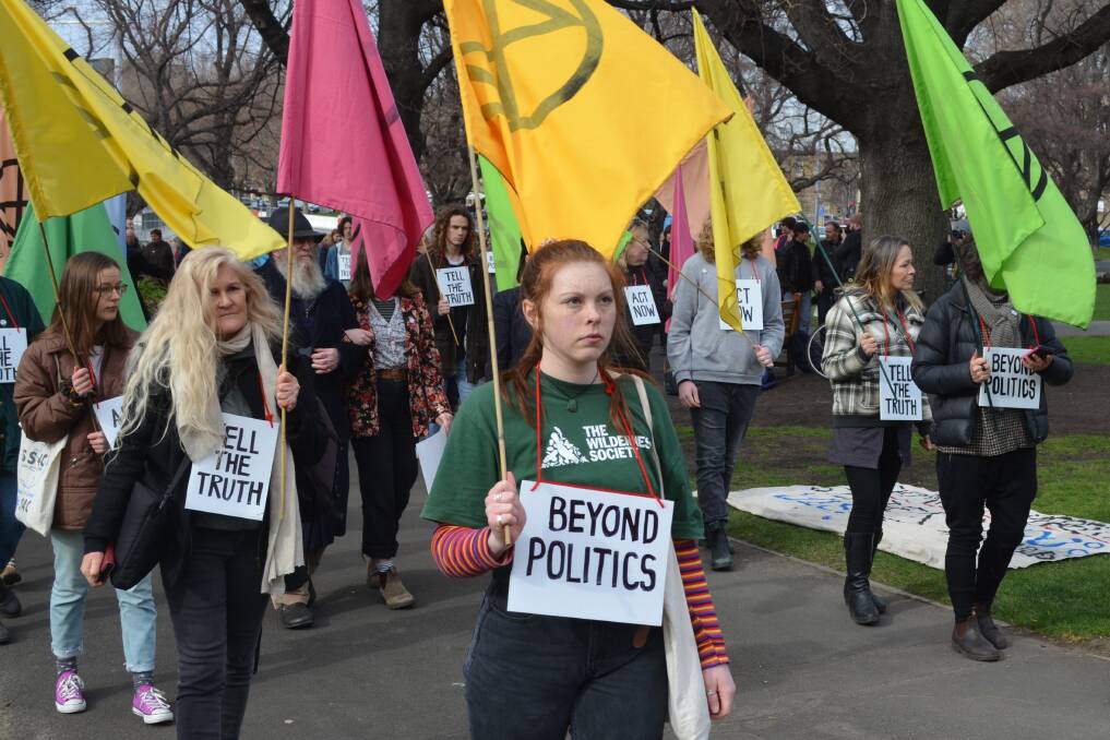 Members of Extinction Rebellion have demanded climate action outside Parliament House in Hobart. Pictures: Emily Jarvie 