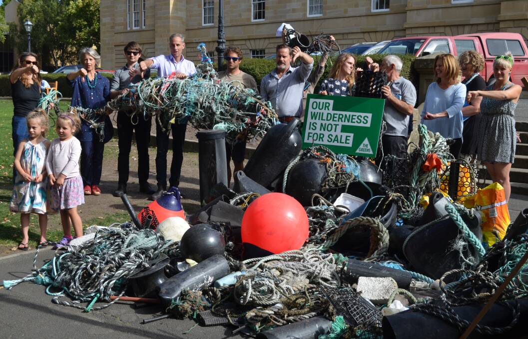 THUMBS DOWN: Members of the Tasmanian Greens and the Tasman Peninsula Marine Protection with marine debris they have collected in recent weeks. Picture: Emily Jarvie 