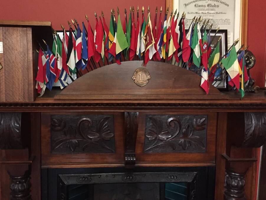 LOCAL: The local Lions Club members are strong supporters of St Marys Hotel. Their flags are displayed above an old fireplace. Picture: Sarah Aquilina