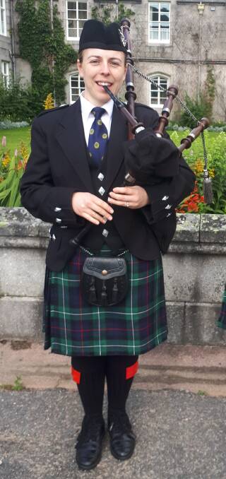 Ms Richter performing in front of the Balmoral Castle this year with her beloved bagpipes. Pictures: supplied