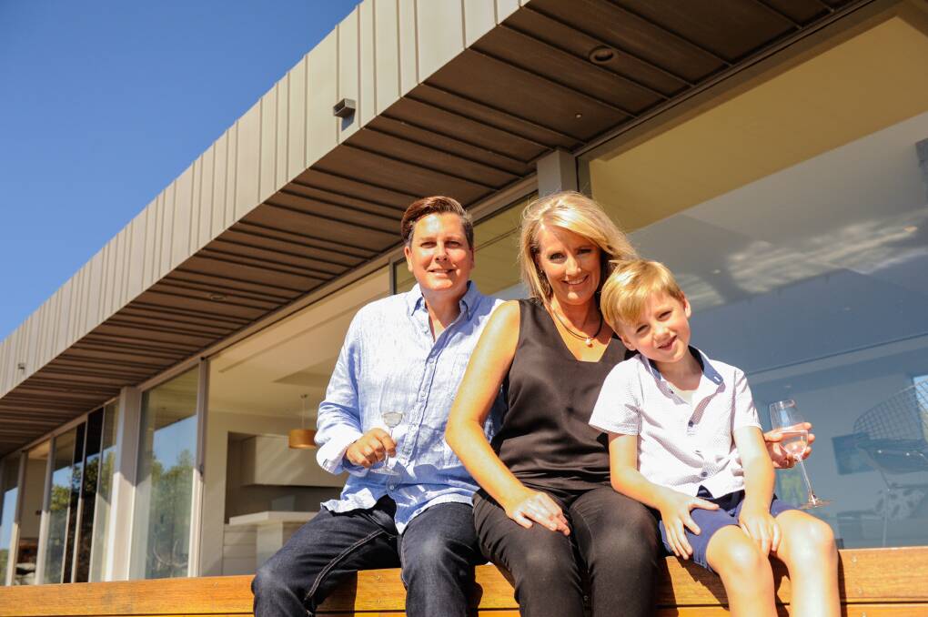 Cathryn Cocker with her husband Dean and their son. Picture: Sean Robson