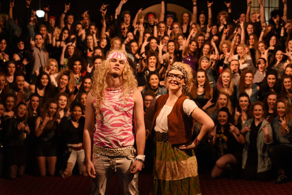 CENTRE STAGE: Connor Claridge as Stacee Jaxx and Lucy Woodland as Regina in the Launceston College production of the Rock of Ages. Picture: Scott Gelston