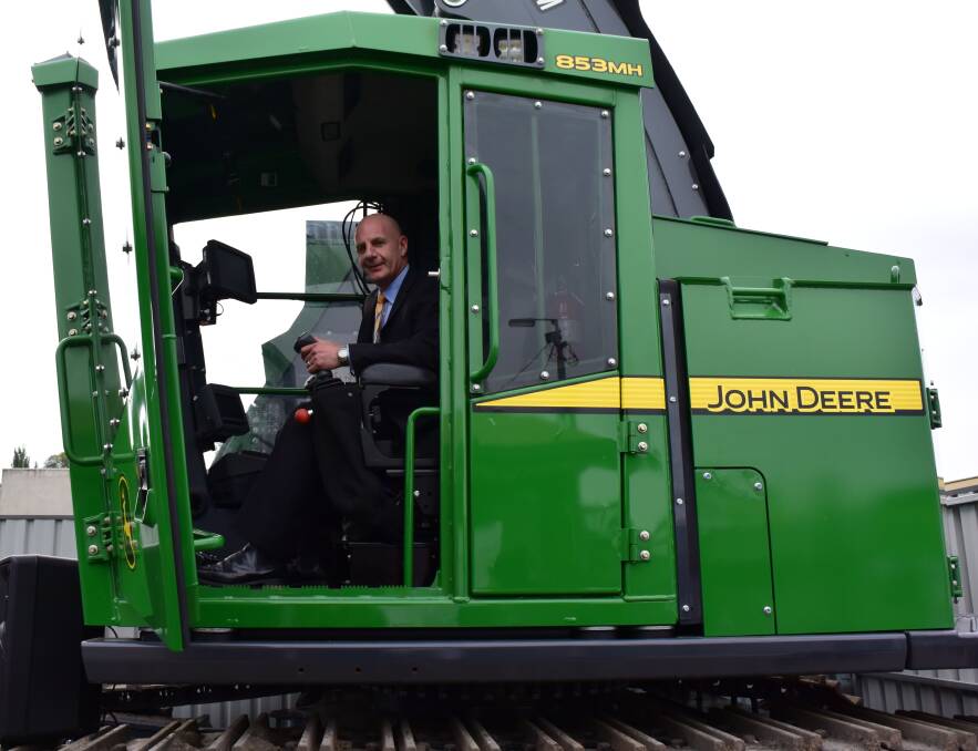 Forestry Minister Peter Gutwein checking out a John Deere Harvester at the Arbre Forest Industries Training & Career Hub launch on Wednesda. Picture: SARAH AQUILINA