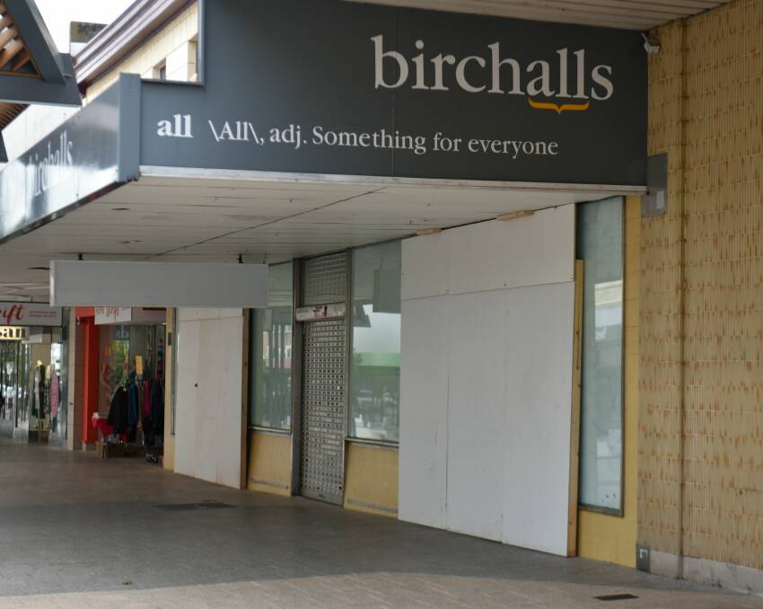 Two entrances at the former Birchalls building where homeless people sought refuge have been boarded up. Picture: Neil Richardson