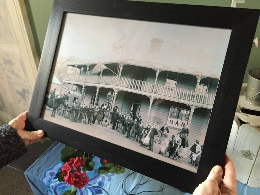 GIFT: A resident of St Marys found an old picture of the hotel and gifted it to the Weyer family. Picture: Sarah Aquilna