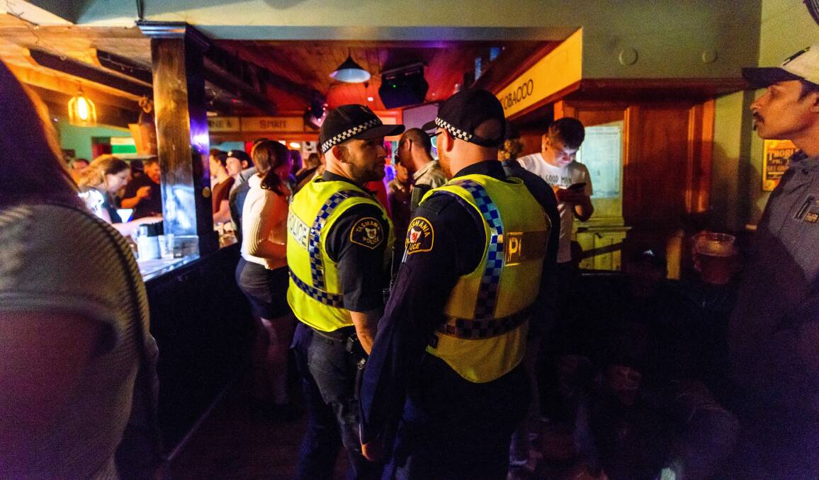 FOOT PATROL: Tasmania Police Constables do a walk through of Irish to check for anti-social behaviour. Picture: Scott Gelston