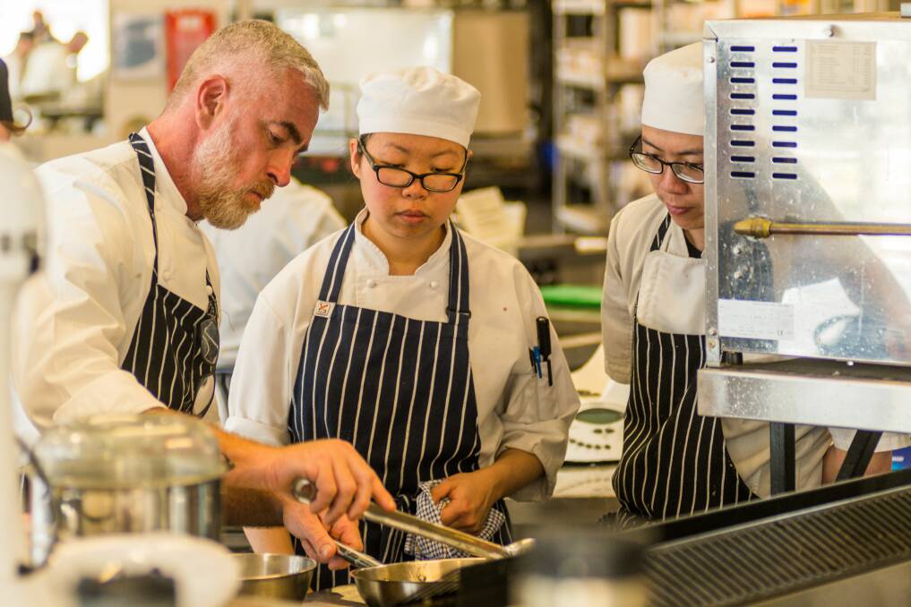 TECHNIQUE: Chef Alex Atala at TasTAFE Drysdale House kitchen. Picture: Phillip Biggs