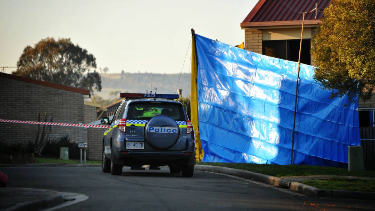 Police and forensics at the double-murder scene in 2012.