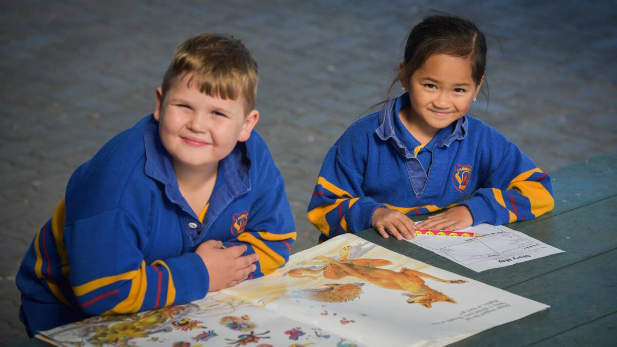 PROGRAMS: Larmenier Catholic School gifted pupils Ira Radford 7 and Ruth Zacarias 9,  Picture: Paul Scambler