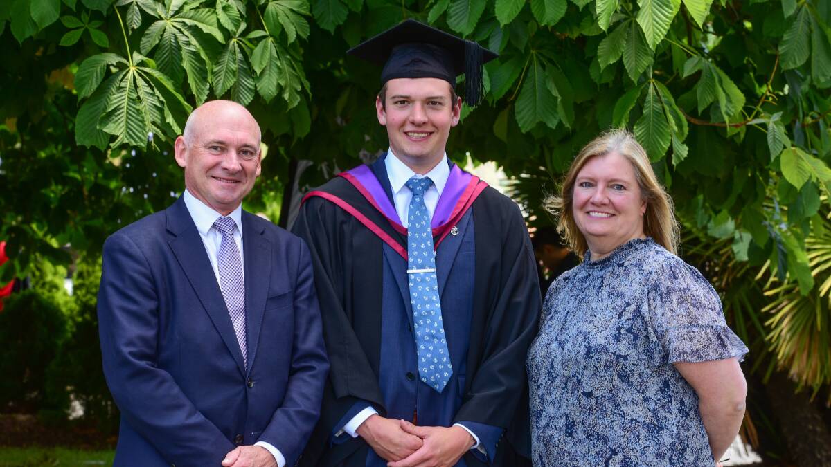 FOCUSED: Australian Maritime College graduate Sam Price with his parents James Price and Jacki Smith, of Adelaide, ahead of his graduation ceremony on Wednesday. Pictures: Paul Scambler