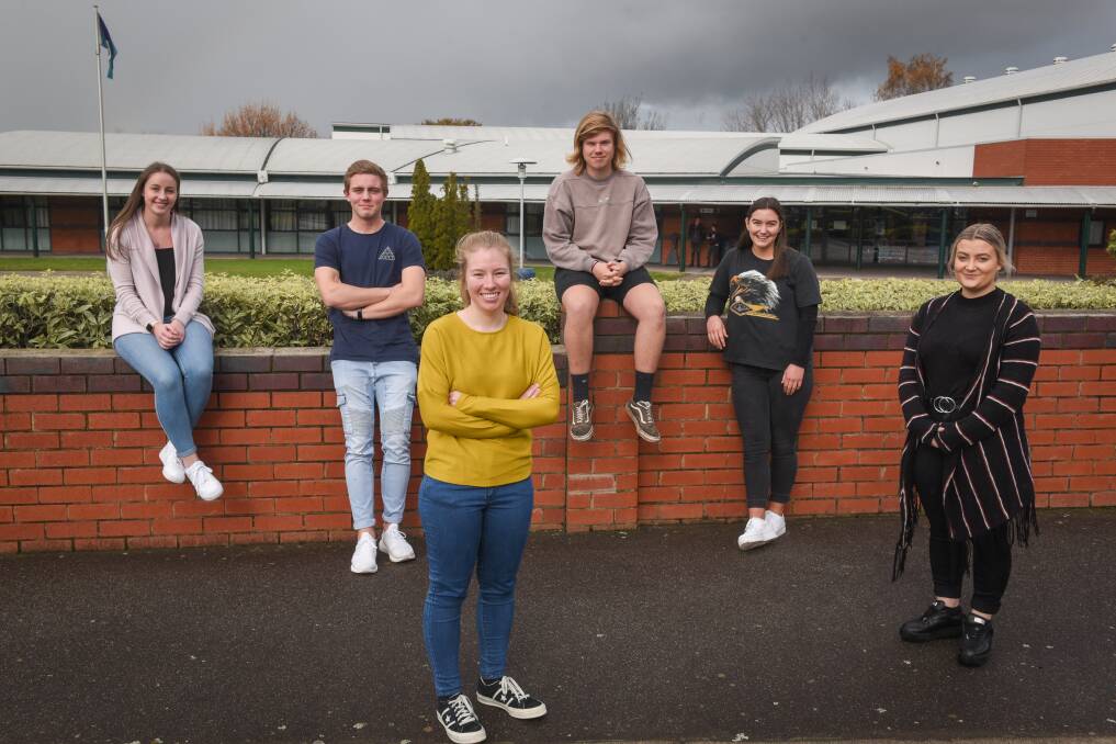 UNCERTAINTY: Newstead College year 12 students (from left) Lauren Spencer, Ned Whiting, Amy Wright, Corin Davis, Lucy Walker and Skylah King on navigating their education amid a global pandemic. Picture: Paul Scambler