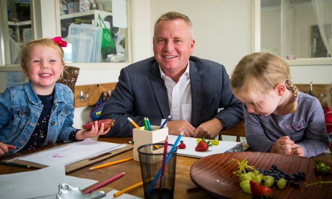 ROLL OUT: Education Minister Jeremy Rockliff with pre-school students in Glenorchy at the launch of the pilot program for three-year-olds. Picture: Alastair Bett