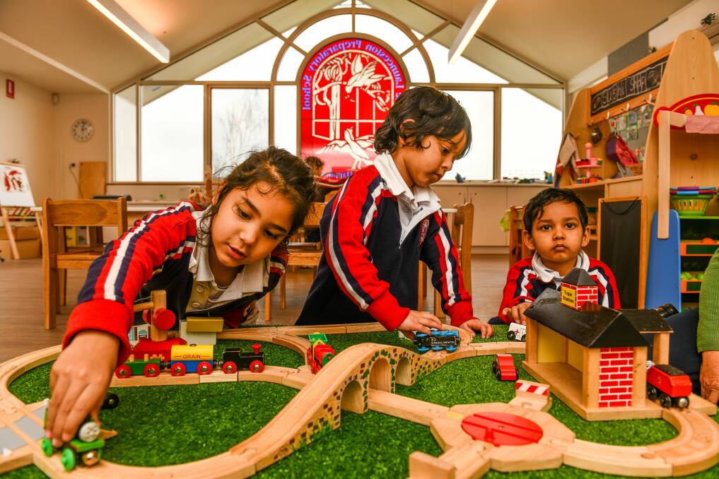 NEW DIGS: Launceston Preparatory school early learning students Kora Gopala, Eishaan Behary Paray, Shivansh Madine in their new learning space. Picture: Scott Gelston