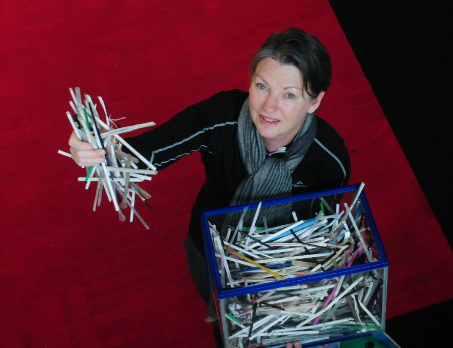 LESS IS MORE: Plastic Free Launceston's Trish Haeusler with some straws she collected during clean-up visits along the Tamar River. Picture: Neil Richardson