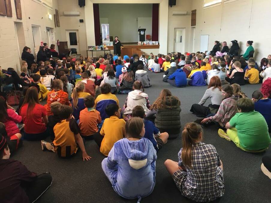 PAGES TURNED: Childrens' author Christina Booth hosting an interactive workshop at Beaconsfield Primary School for national Book Week.