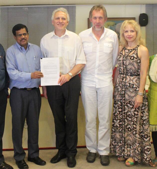 RICE PARTNERS: TIA director Holger Meinke (second from left) with some of the food security project officers in India after an agreement was signed last week to develop salt-tolerant rice. Picture: contributed.