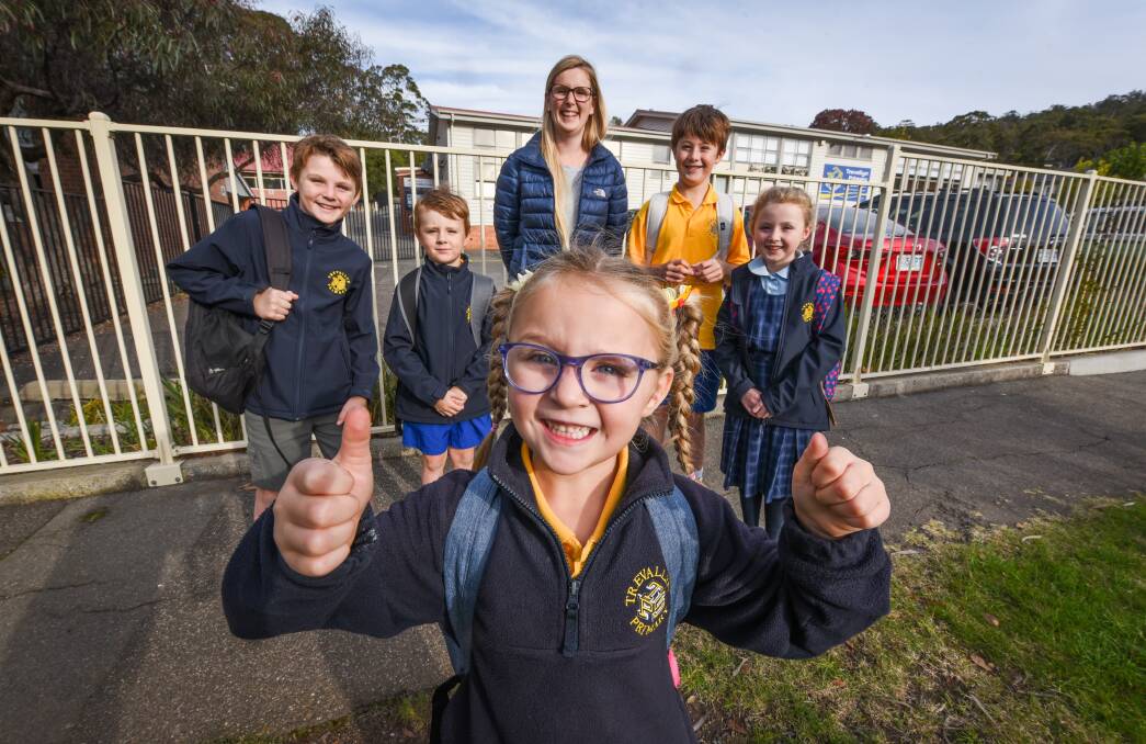 NEW TERM: Claire Blyth and her children, Harry, 11, Oscar, 9, Milla, 8, Max, 6, and Willow, 5 after their first day back at Trevallyn Primary School. Picture: Paul Scambler