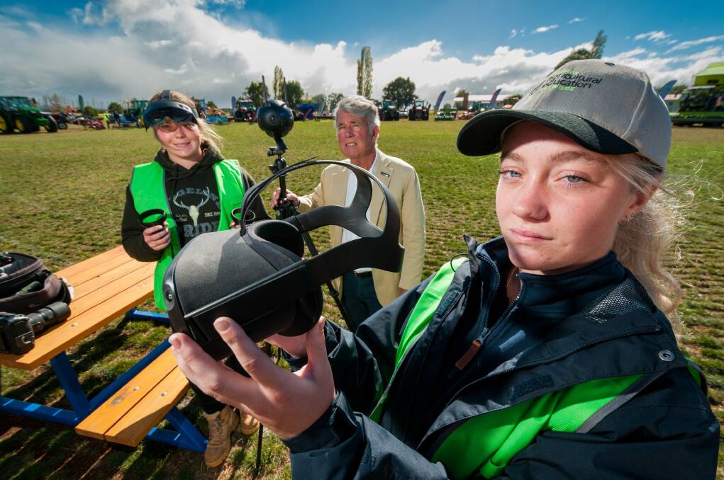 TECH EXPO: Scottsdale High School student Nikayla Smith, Tasmanian Agicultural Productivity Group executive officer Terry Brient, and Sophie Smith, also of Scottsdale High, at the TAPG Ag innovation expo at Hagley Farm School. Picture: Philip Biggs