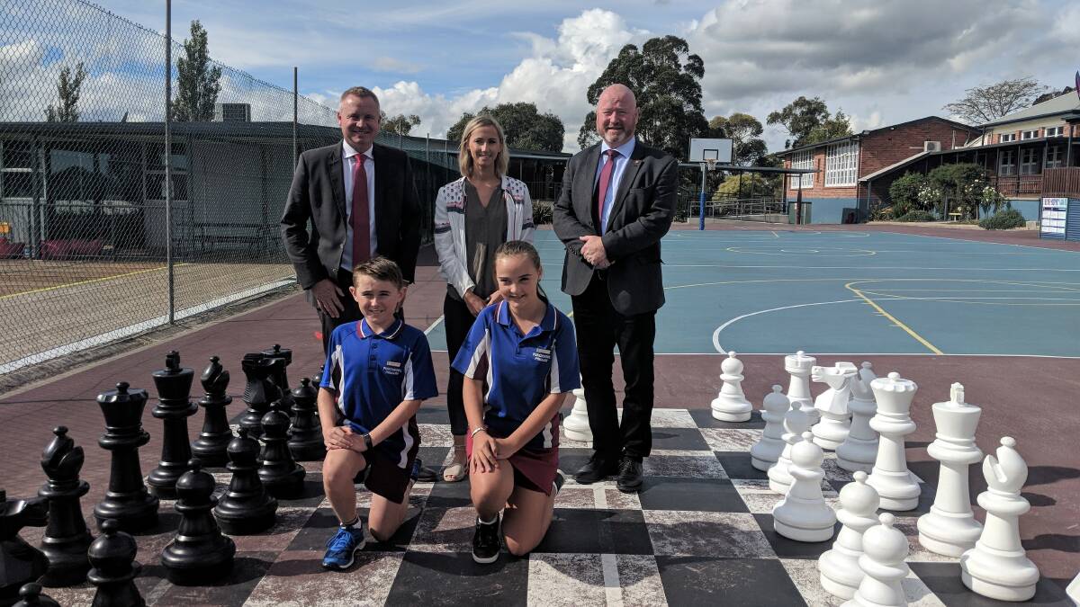 SOLUTION: Punchbowl Primary School pupils Oliver Stebbings, 11, and Paige Binns, 12, with Education Minister Jeremy Rockliff, Grade 5-6 teacher Ellen Bodell and Principals' Association president Malcolm Elliott. Picture: Caitlin Jarvis