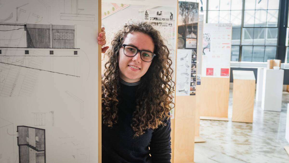 EMBRACING THE ORDINARY: University of Tasmania Master of Architecture graduand Georgia Woodward with her final project works. Miss Woodward will graduate as part of Launceston graduations on Wednesday. Picture: Paul Scambler
