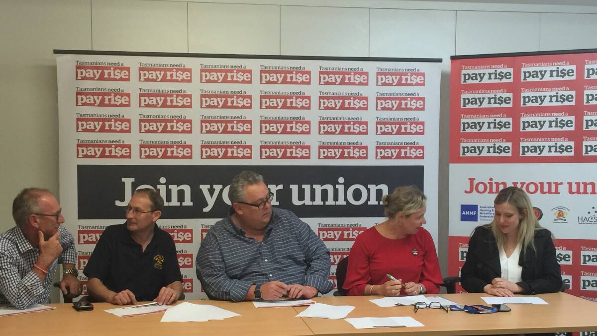 FED UP: Health and Community Services Union's Tim Jacobson, Community and Public Servants Union's Tom Lynch, United Firefighters Union's Leigh Hills, Australian Education Union Tasmania's Roz Madsen and Australian Nursing Midwifery Federation's Emily Shepherd. Picture: supplied

 