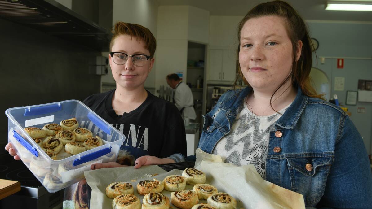 Josephine Kidd, 15, of Exeter High and Hannah Burr, 15 of Brooks High in the catering kitchen. 
