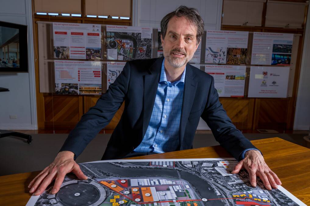 VISION: University of Tasmania vice chancellor Rufus Black, with the Inveresk campus master plan, released in June. Picture: Phillip Biggs