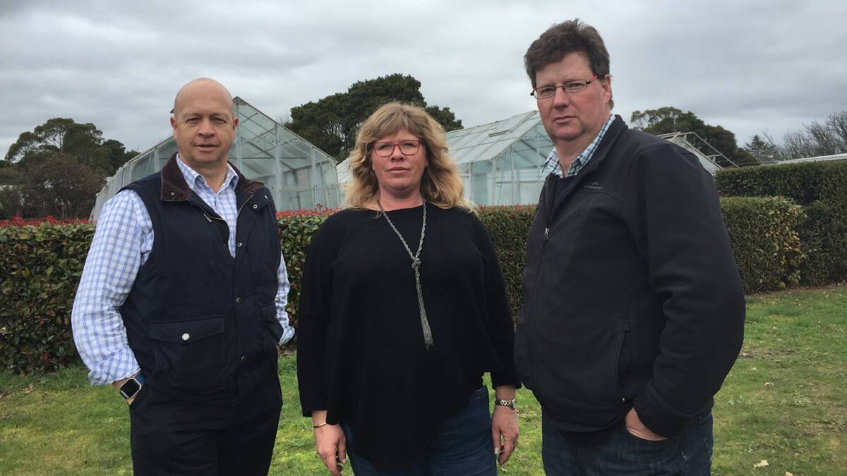 CONCERN: Gravelly Beach blueberry farmers Rachel DeWit and Steve Clements with Fruit Growers Tasmania's Phil Pyke at the meeting, held at Mt Pleasant laboratories on Thursday. Picture: Caitlin Jarvis.