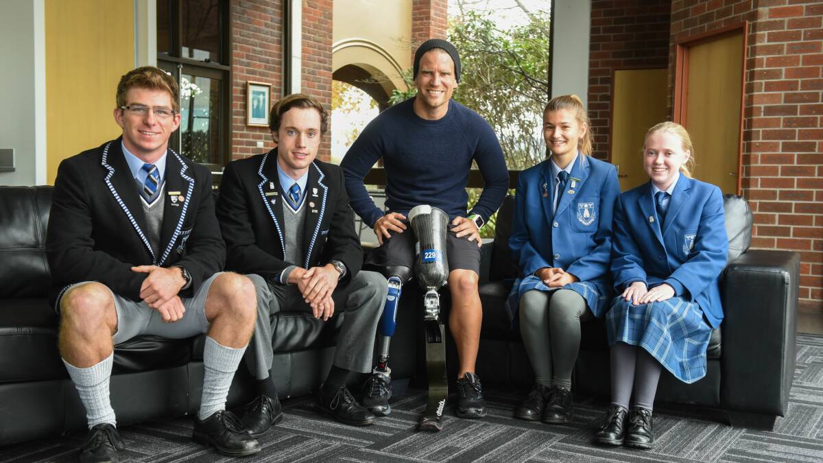 INSPIRE: West Australian Paralympian Brant Garvey talks with Launceston Church Grammar students Lachlan Stedman, Will Barber, Jet Witte and Sophie Breward. Picture: Paul Scambler. 