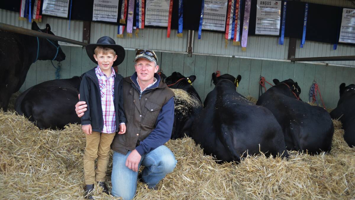 PAST SHOWGOERS: Oakley Hall, 6, and Ben Hall at the Scottsdale Show last year. 