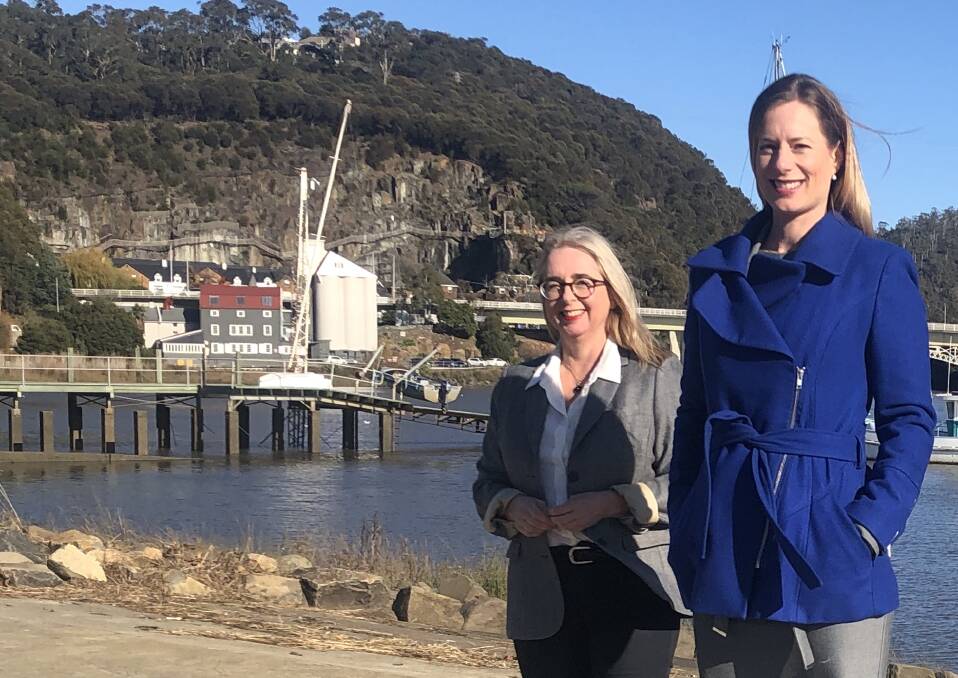 WAIT FOR REPORT: Labor Leader Rebecca White and incumbent Bass member Michelle O'Byrne at the Tamar Estuary. Labor has promised $8 million for the troubled waterway. Picture: supplied 