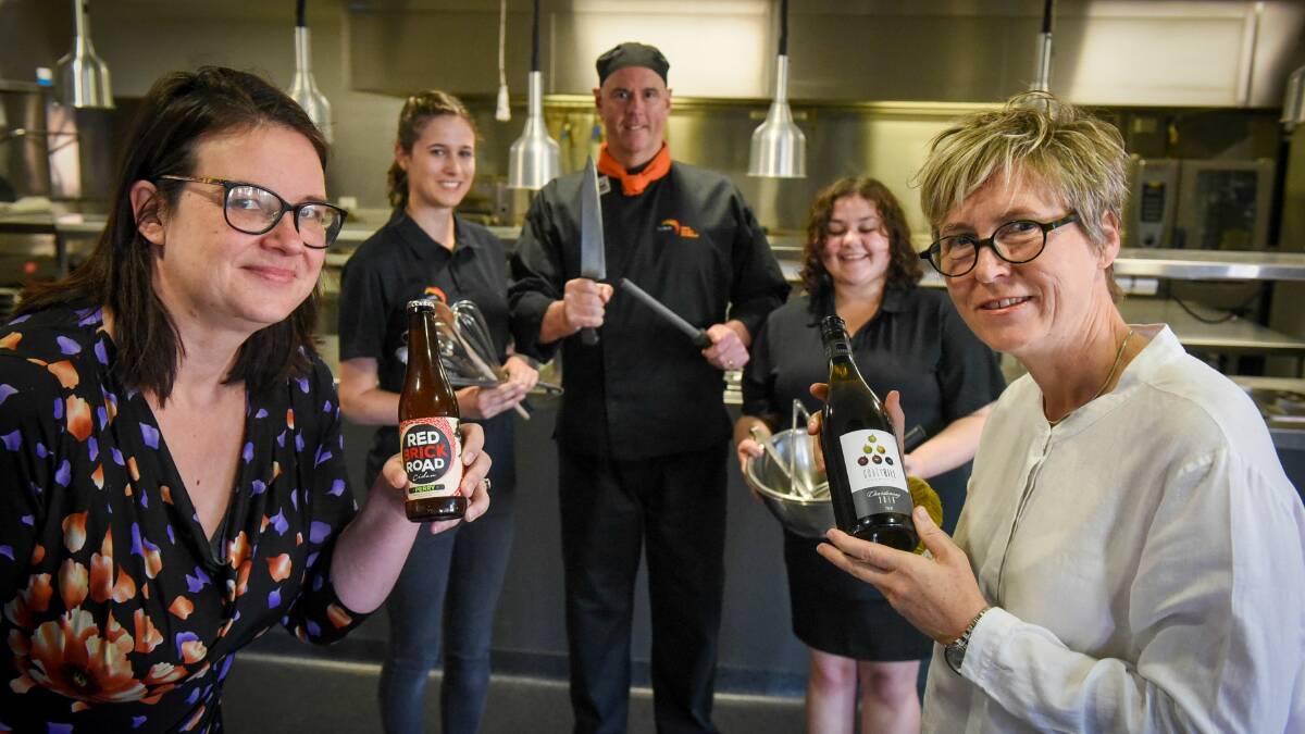 COLLABORATION: Red Brick Cider owner Karina Dambergs with TasTAFE Tourism Cert III student Mae Donald, TasTAFE chef Greg Hillier, student Skye Cusak and Design Centre chief executive Karina Clarke. Picture: Paul Scambler 
