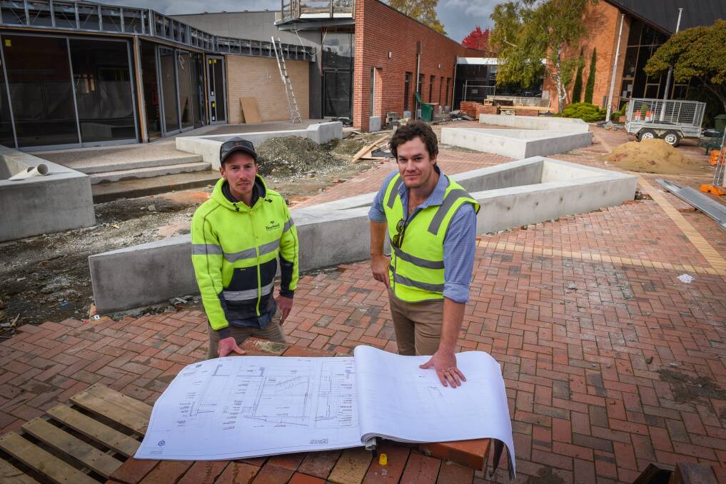 VITAL INDUSTRY: Beardwood site manager Dave Zeeman and Luke Beardwood at the St Patrick's College work site. Picture: Paul Scambler