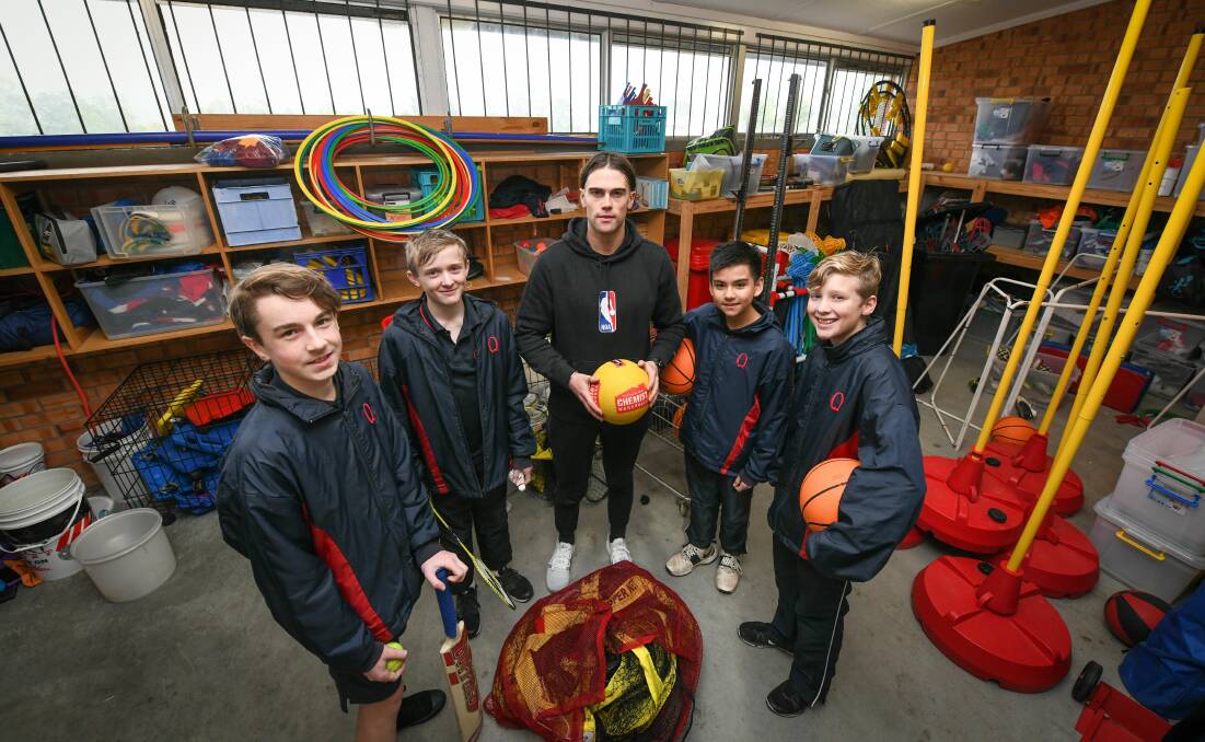 HOMEGROWN HEROES: Queechy High School teacher Luke Tepper with grade 8 students James Long, Liam Dracup, Colin Burridge and Jethro Dates. Picture: Paul Scambler