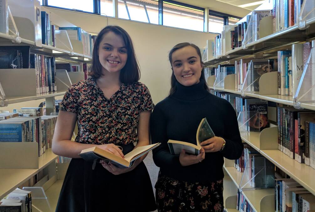 SUCCESS: Newstead College Year 11 students Emma Nicholas and Jessica Faulkner have had recent success in public speaking, creative writing and drama competitions. Picture: Caitlin Jarvis 