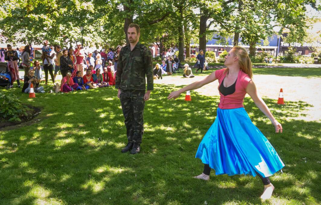 EXPRESSION: Kate Robinson and Ben Kromkamp from the Door of Hope, perform a reflective dance of peace at the The Sounds of Peace at Prince's Square. Picture: Paul Scambler