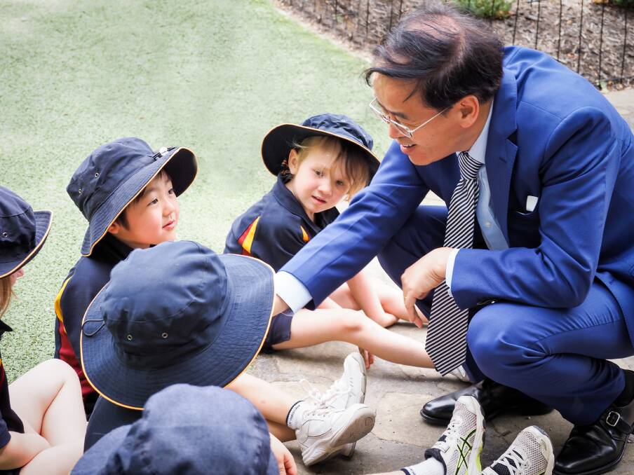 Chinese Ambassador Cheng Jingye with some of Scotch Oakburn's early learning pupils at the Scotch Oakburn junior campus.