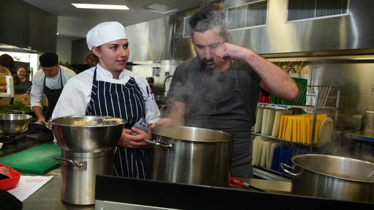 TASTE TEST: Drysdale student Emily Dunbar awaits the final verdict from Hobart chef David Moyle, who is in town for the next Great Chefs series event. The event will be held on Friday night at Drysdale Launceston. Picture: Neil Richardson