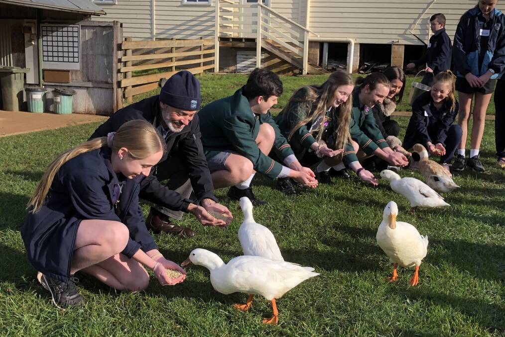 PRACTICE MAKES PERFECT: Primary Industries Minister Guy Barnett with students from Hagley Farm School at the announcement of a new biosecurity education program. Picture: supplied