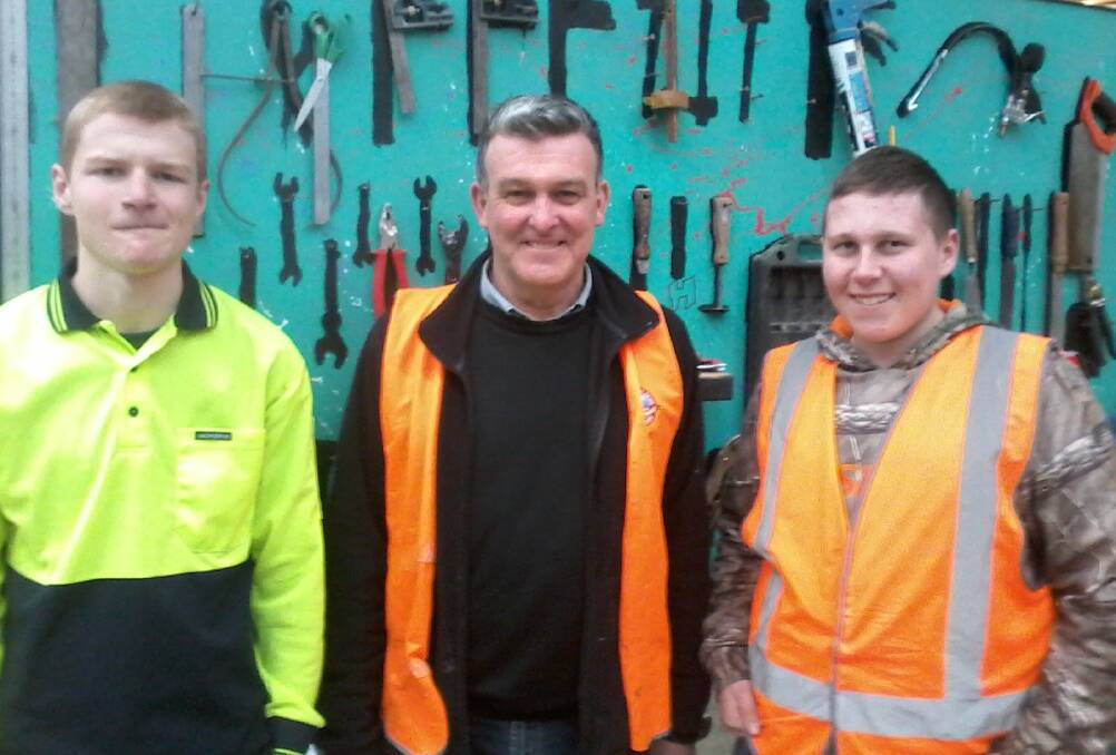 OPEN DAY: Studentworks student Dylan Hawkins, 16, general manager Shon McIntee and student Ditsh Dally, 15 at Rocherlea. Picture: supplied